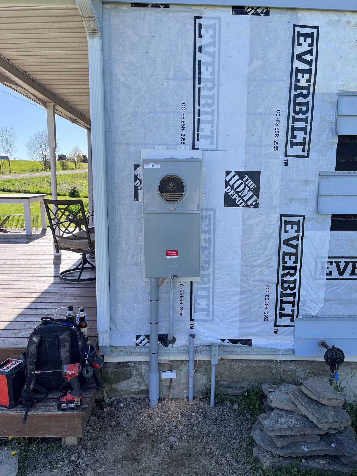 New meter and service mast on a home