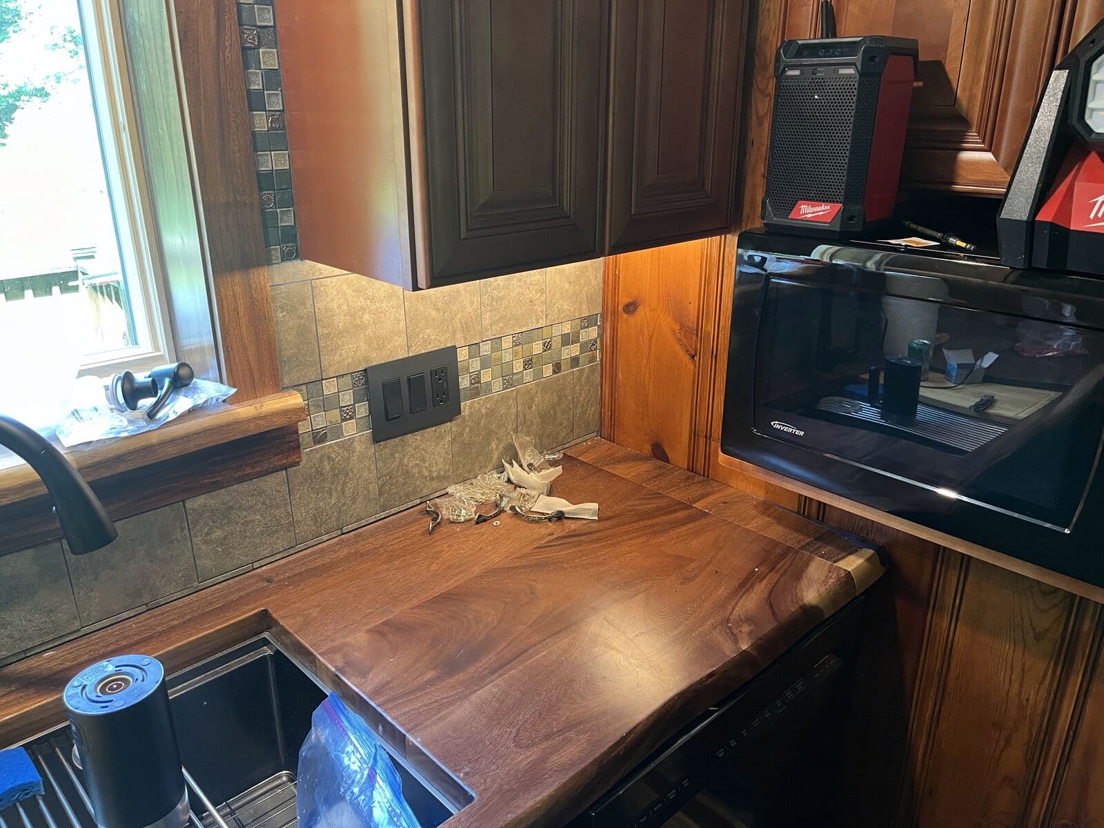 Under-cabinet lighting over a kitchen sink